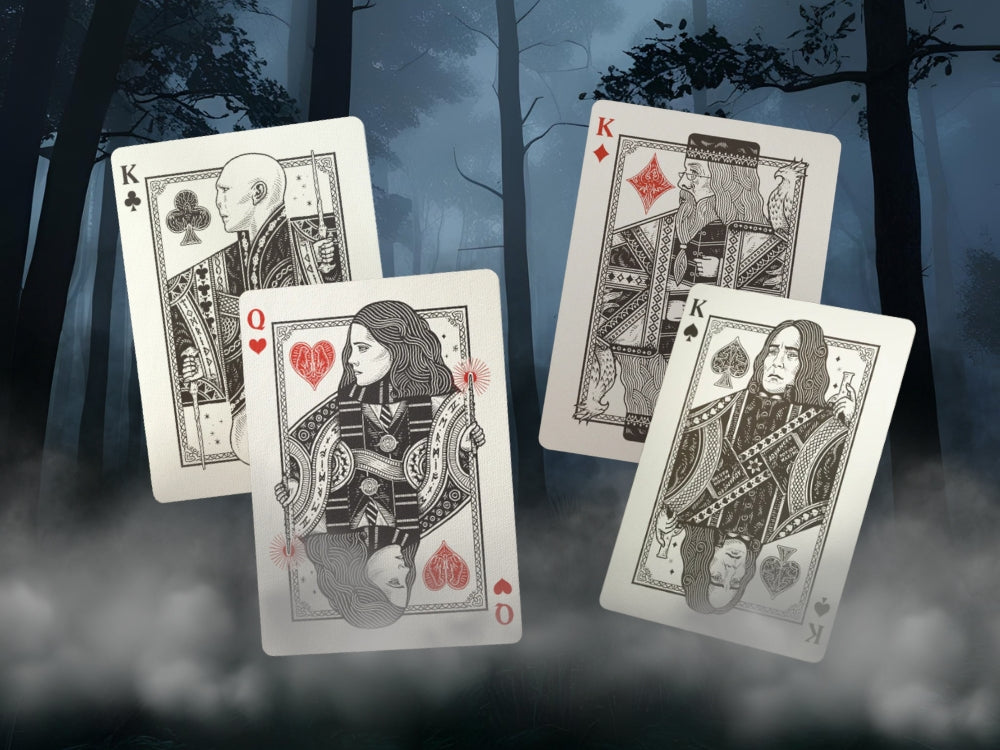 Harry Potter-themed face cards featuring the four playing card suits, shown in a misty forest setting.