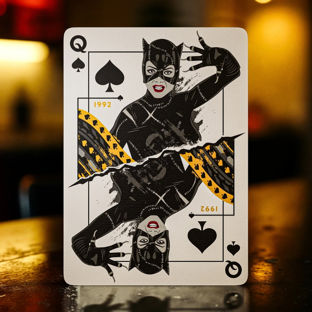 Queen of spades card, taken from a set of batman playing caards. The card features an image of cat woman as played by Michelle Pfeiffer in 1992