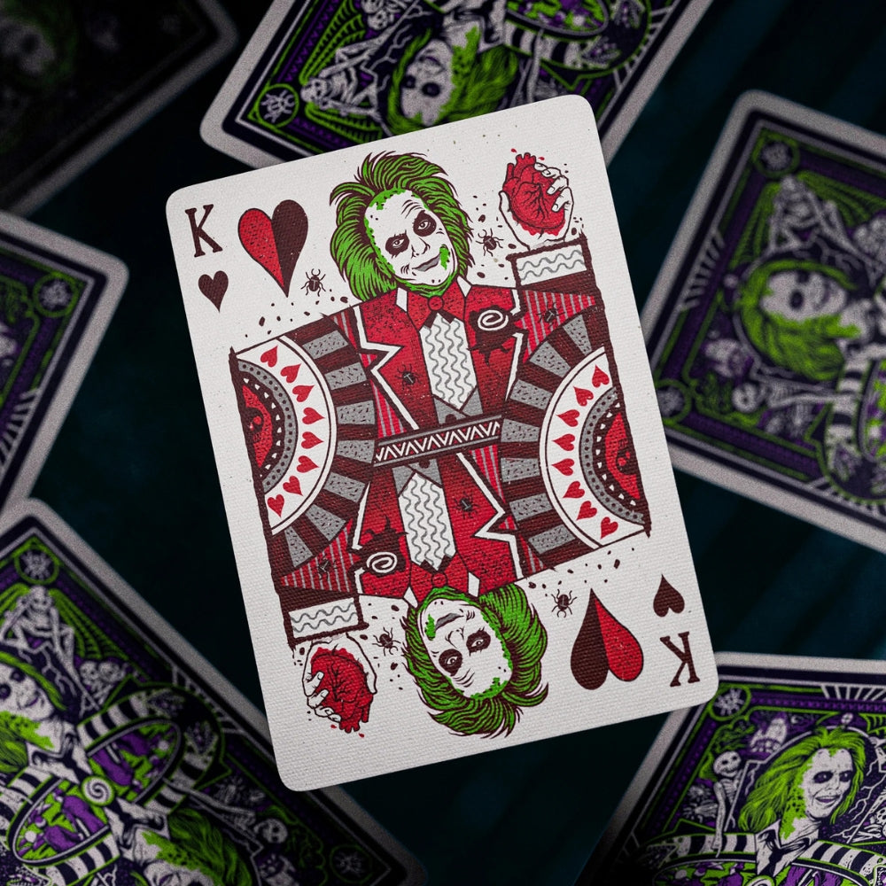 King of hearts, from a deck of beetlejuice cards, showing Beetlejuice holding a heart in his hand