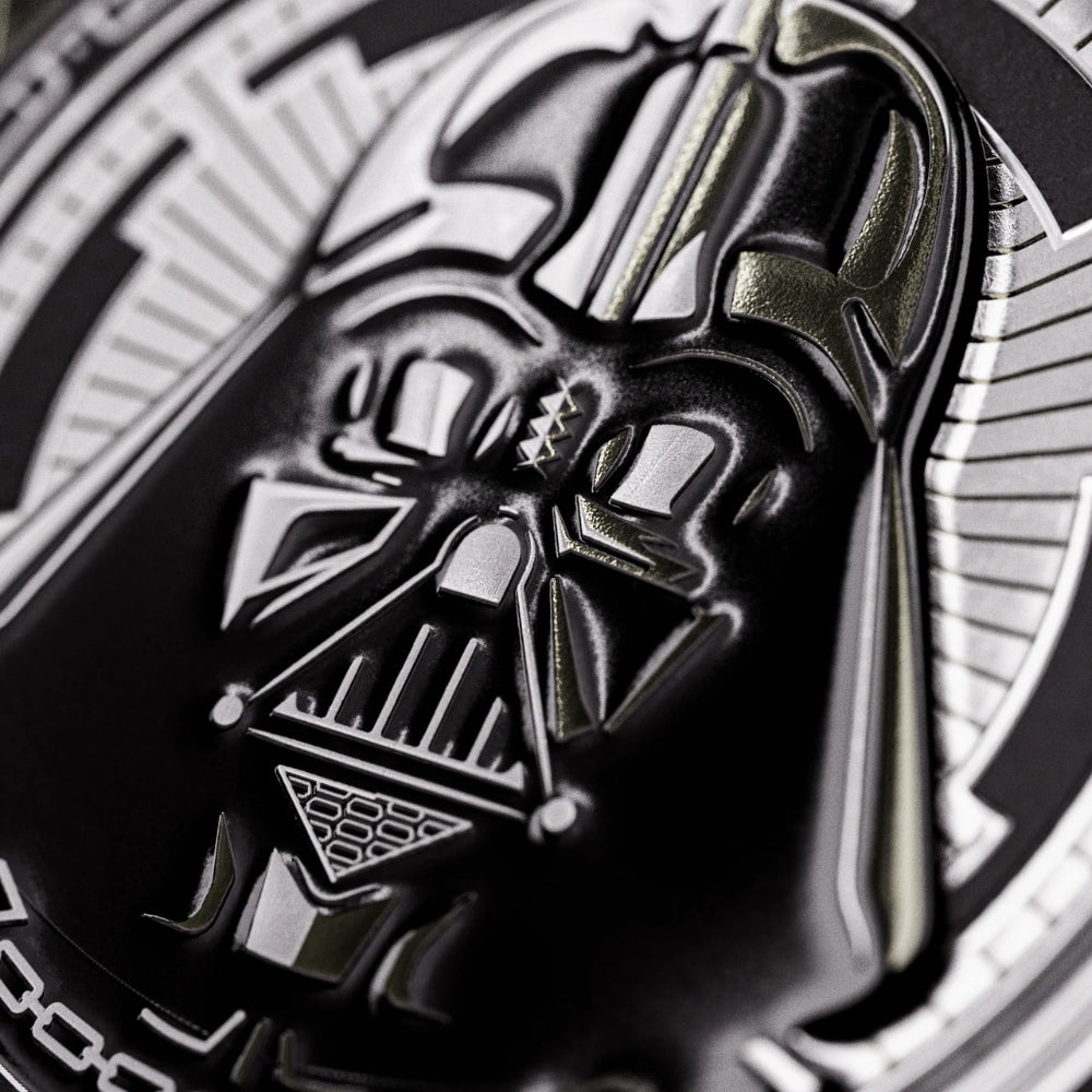 An extreme close-up of the Darth Vader image featured on the deck box of a Star Wars playing card set.