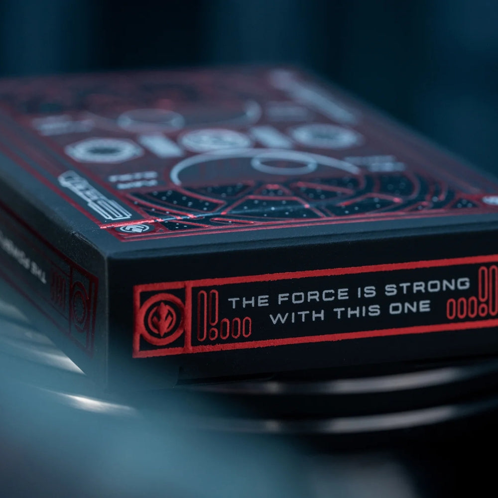 Close up photo of the bottom of a deck box of star wars playing cards - with the phrase - The force is strong with this one