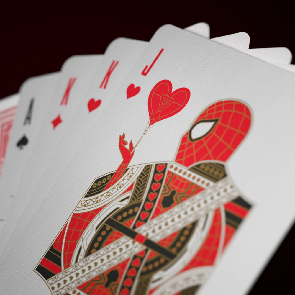 a fan of 4 avengers playing cards, featuring spiderman at the front as the jack of hearts