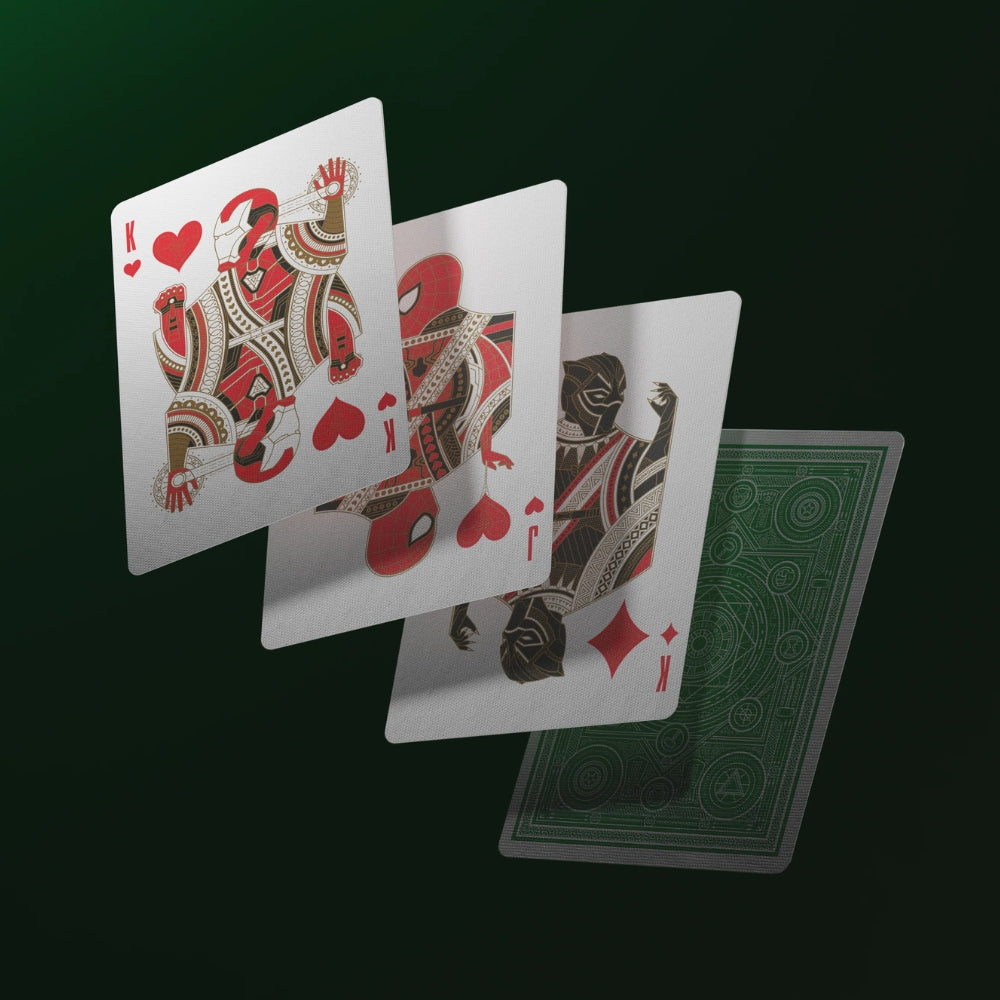 three face cards floating on a green hued background, taken from a set of avengers playing cards