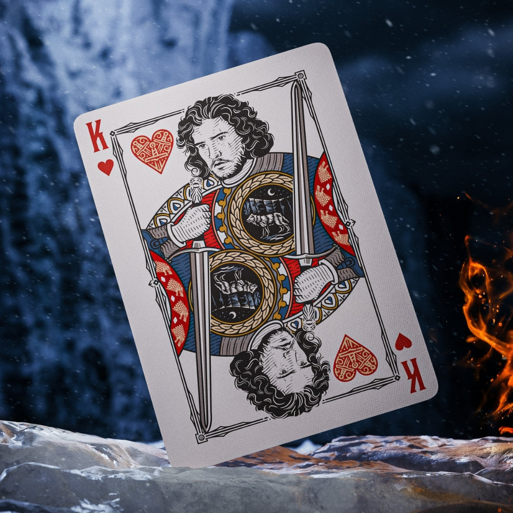King of hearts card, standing on a block of ice, the card is taken from a deck of game of thrones playing cards