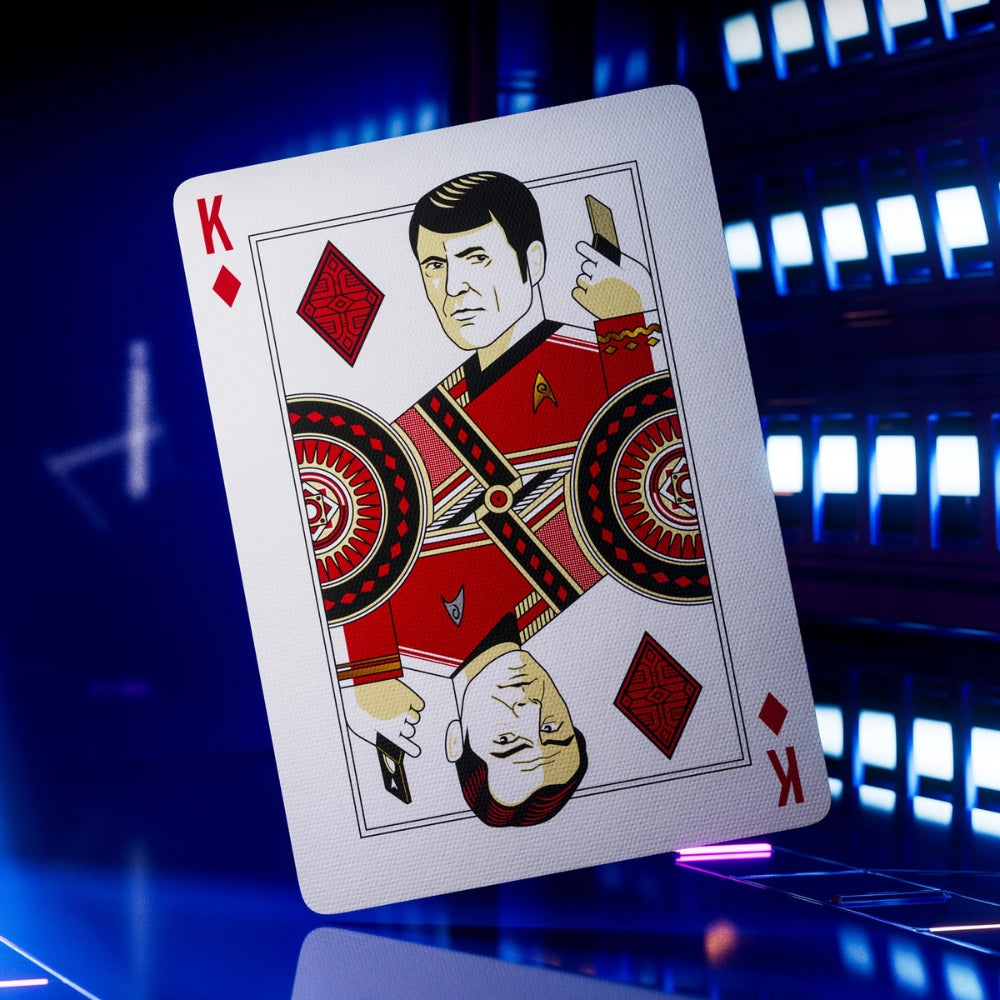 king of hearts playing card, taken from a deck of star trek playing cards, the card standing up in a blue lit room