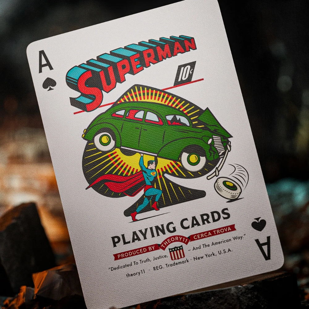 Ace of spades, taken from a deck of superman playing cards. Features superman lifting up an classic green car