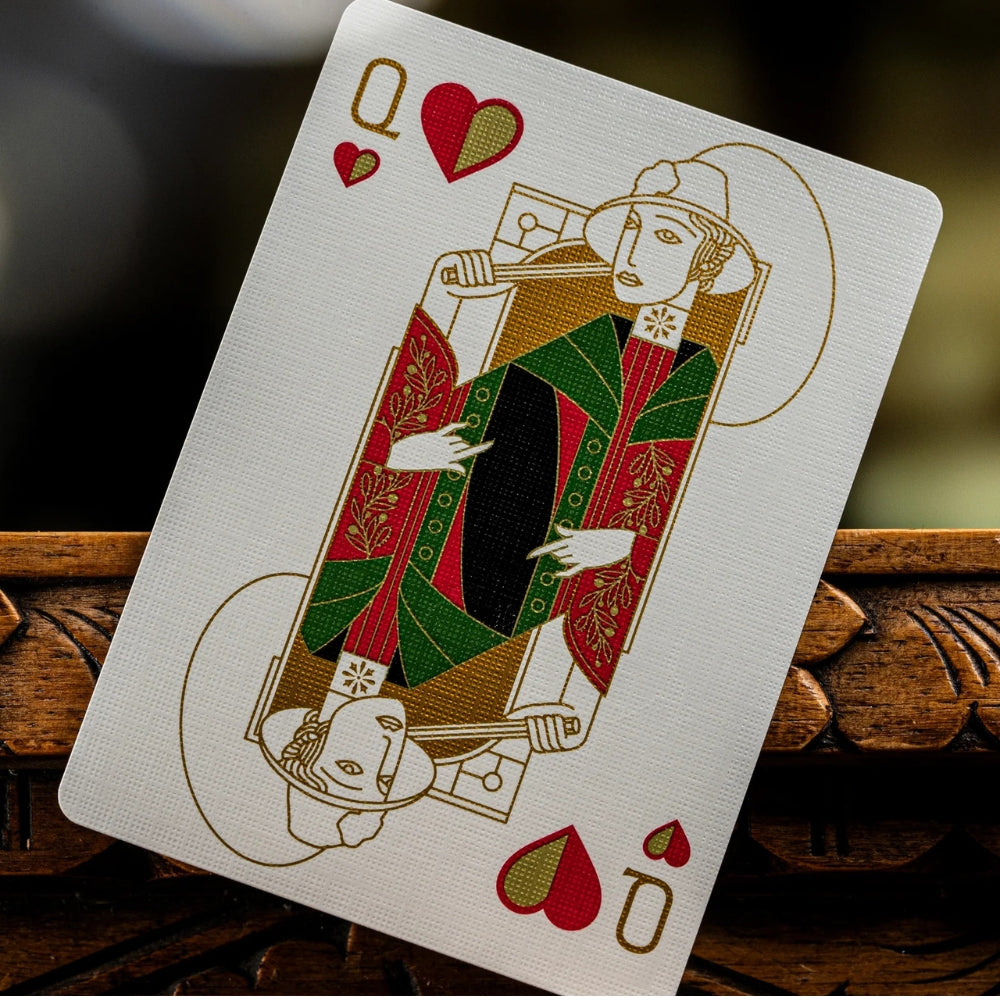 Queen of hearts leaning against a carved wooden surface, taken from a deck of Tavern on the green playing cards