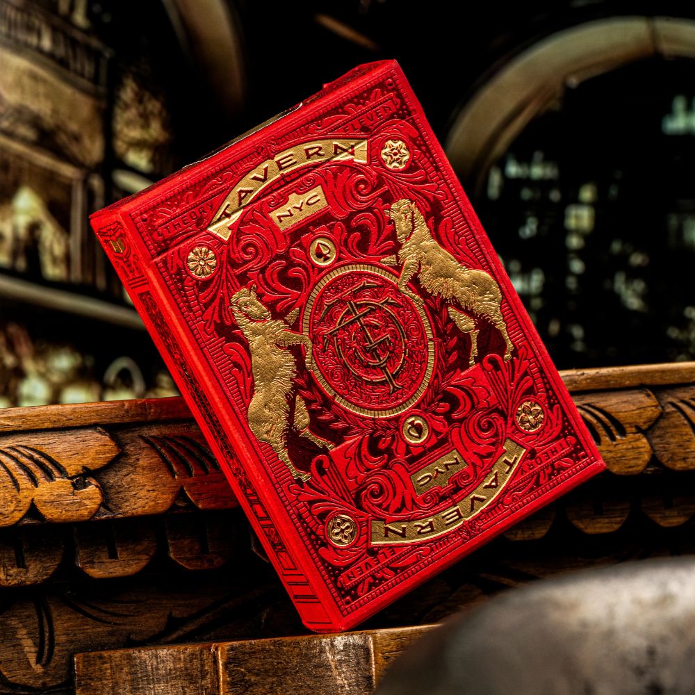 tavern on the green, single red edition deck box on a wooden bar / table