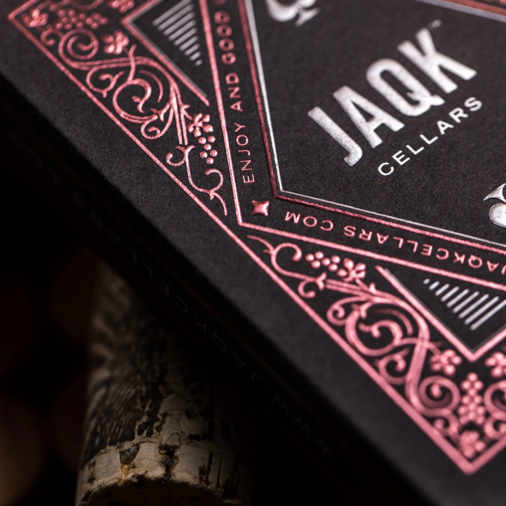 close up of the front edge of the deck box for JAQK playing cards