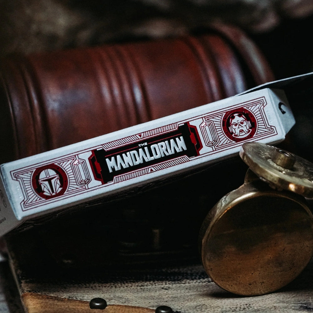 Close up of the side of the mandalorian playing cards box, laying on some junk