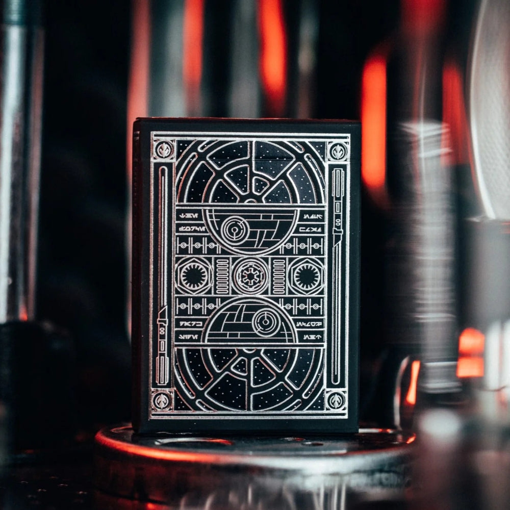 Back of a box of star wars playing cards, black and silver in design