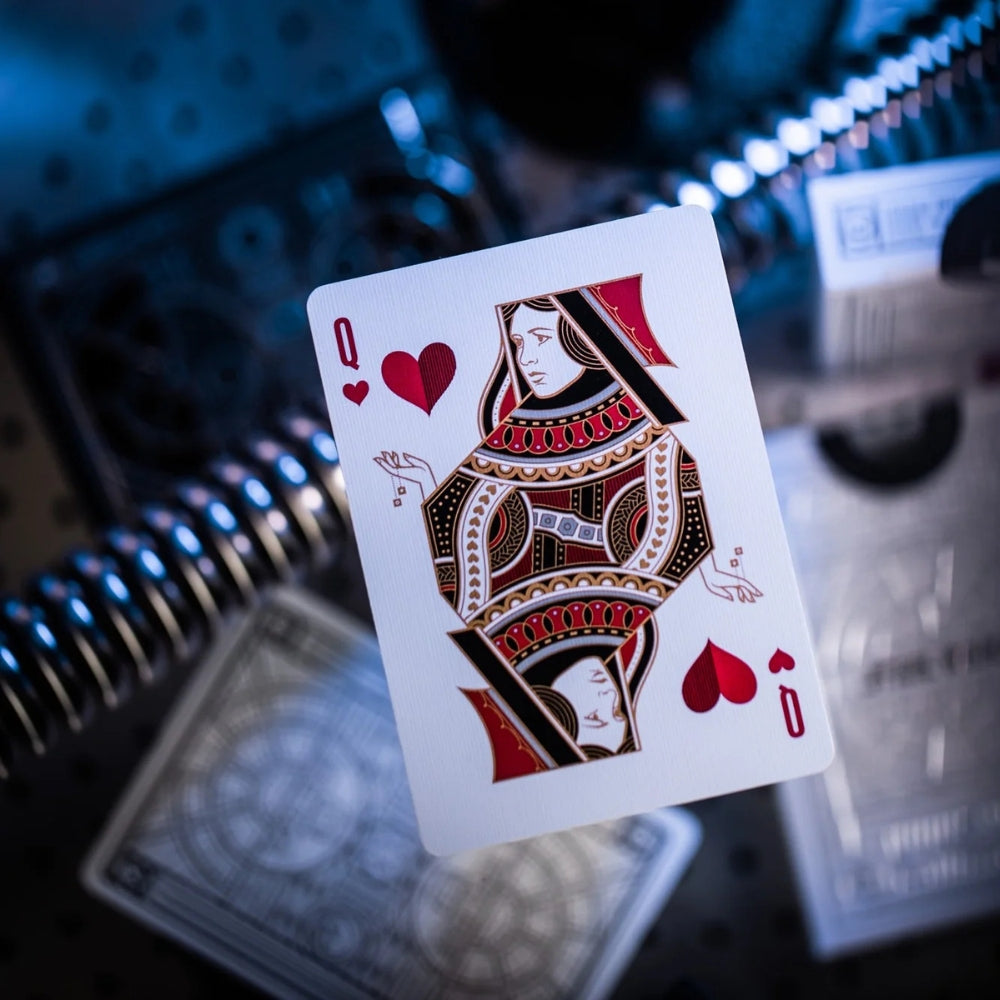 Queen of hearts star wars playing card floating over a selection of deck boxes