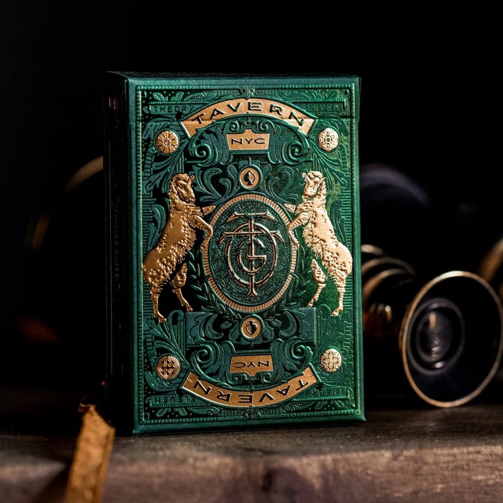 Tavern on the green playing cards - single deck box on a wooden surface with binoculars in the background