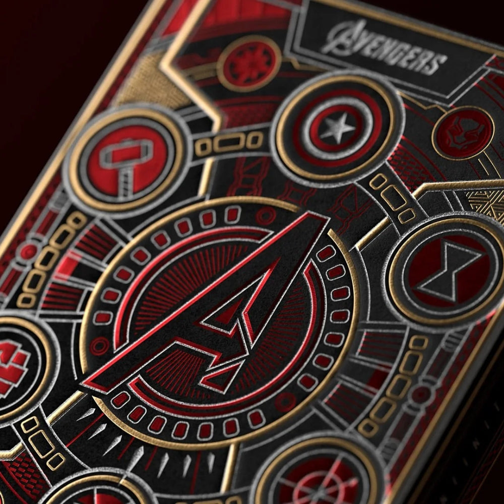 close up of the red avengers playing card deck box, with a light source to show shininess of the foil on the box