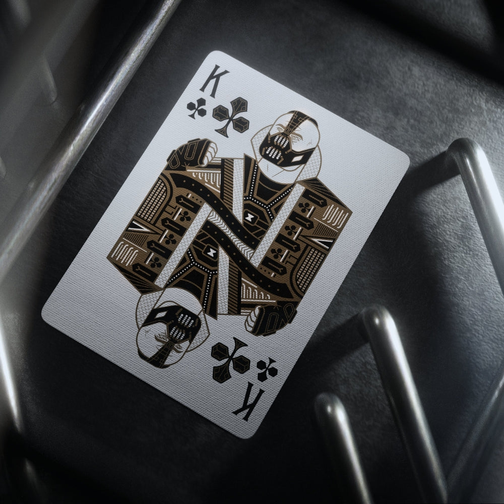 Close up of the king of clubs batman playing card, featuring Bane