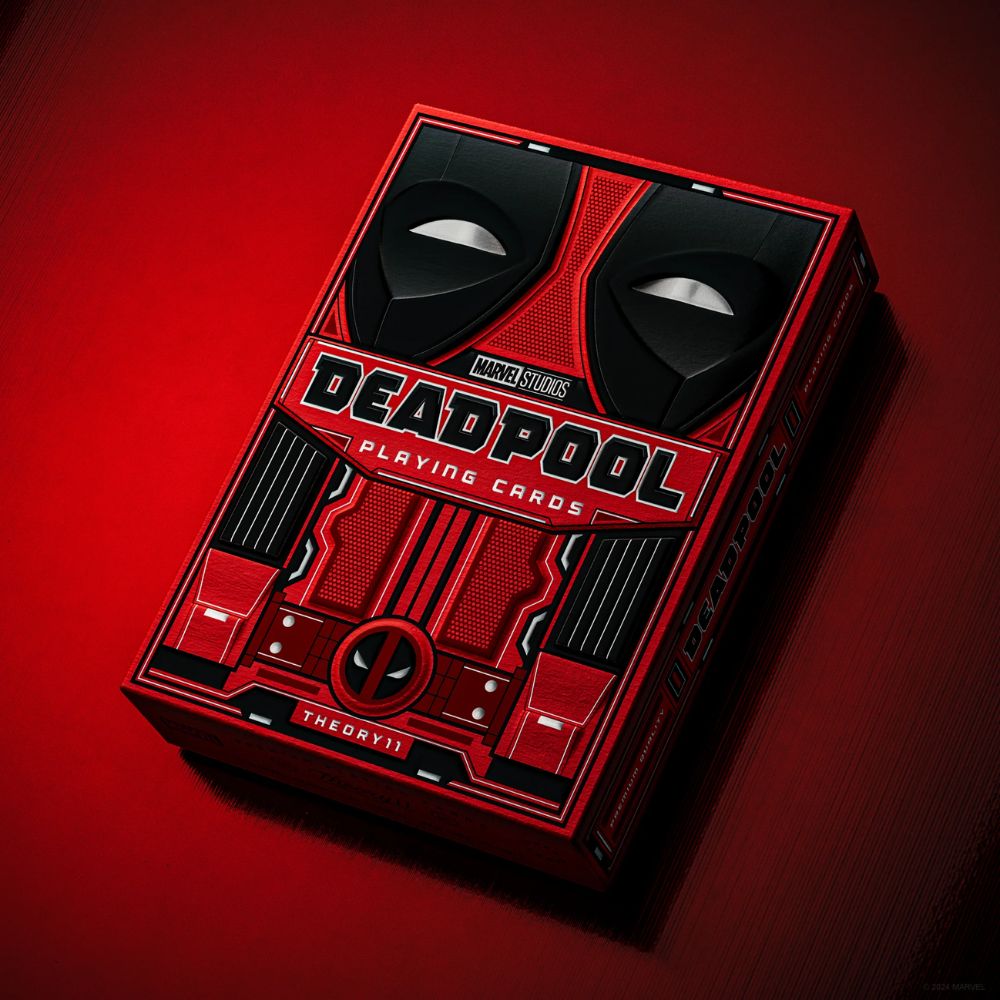 Deadpool playing cards - deck box on a painted red surface