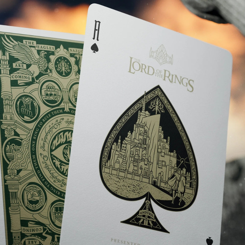 Close up of an ace of spades from the Lord of the rings playing cards set, you can also see a face down card in the background
