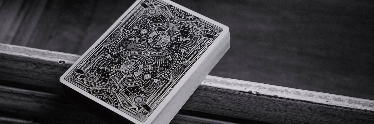 Single deck of cards on a wooden table