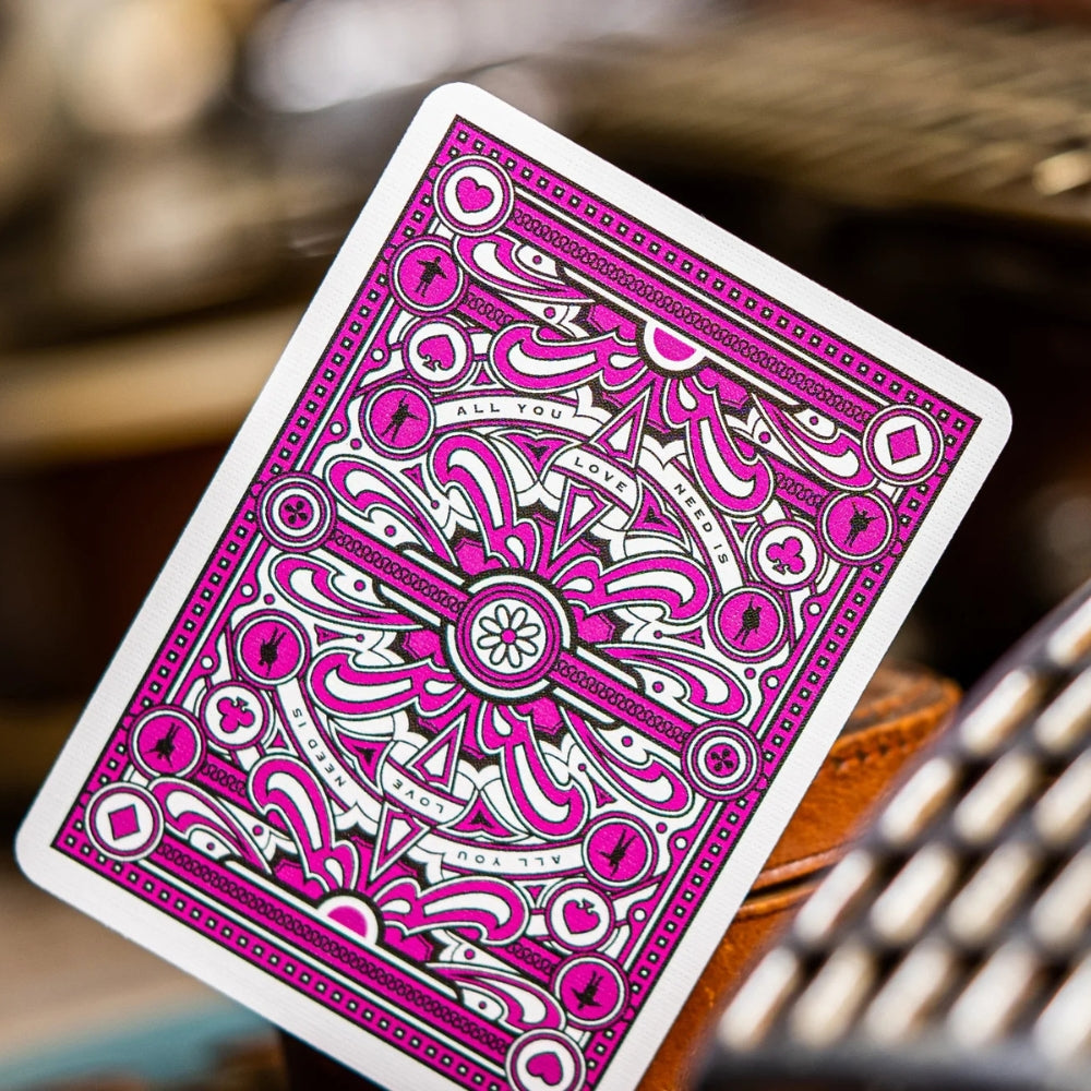picture of the back of a card from The Beatles playing cards (pink)
