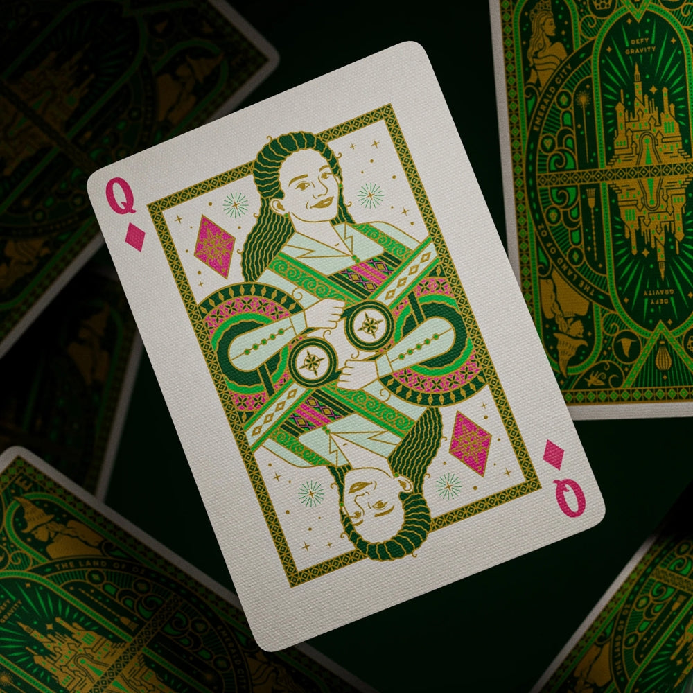 Queen of diamonds floating with face down cards scattered around it. All cards taken from a deck of wicked playing cards